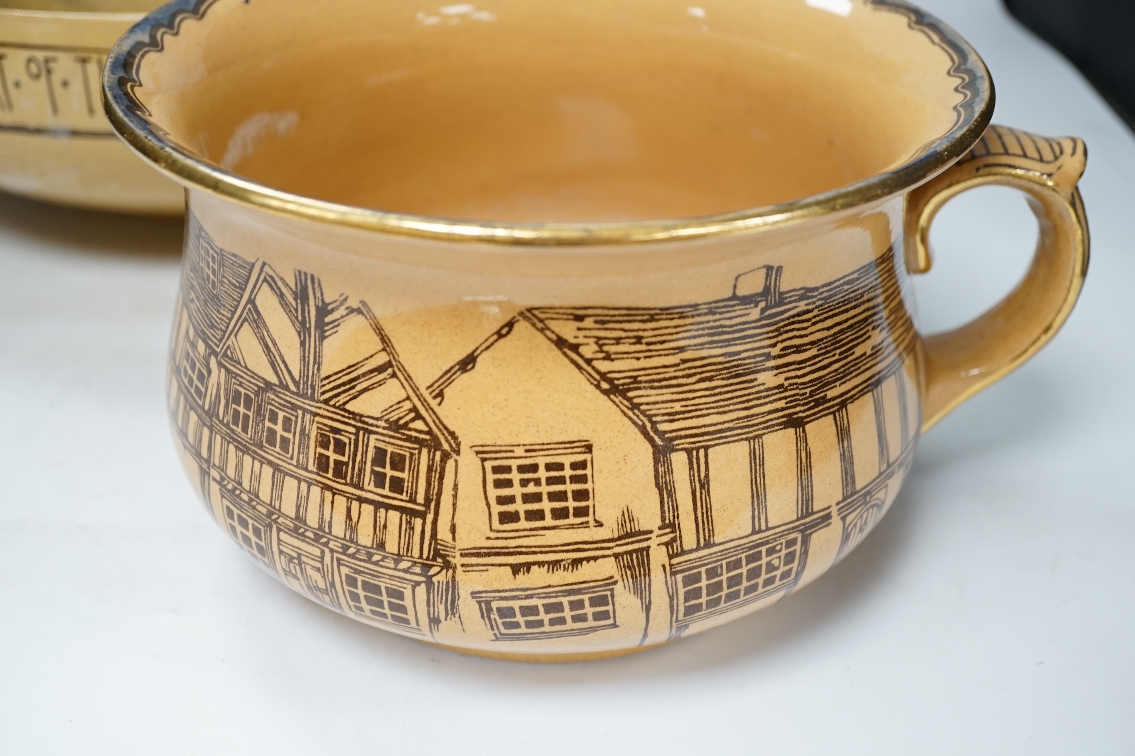A Royal Doulton pottery Night Watchman three piece toilet set comprising wash jug, basin and chamber pot, largest 36cm in diameter. Condition - fair, basin with wear